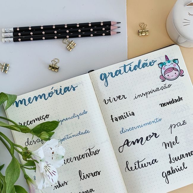 Beautiful journal open with words of gratitude and memories, surrounded by stationery. — Andrea Nascimento, Pexels