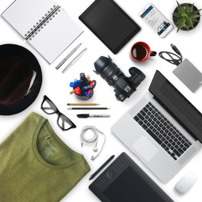 Top view of a creative workspace with camera, laptop, and accessories, perfect for a designer or photographer. — OVAN, Pexels